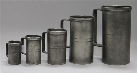 A set of 5 French hand-made graduated pewter measures
